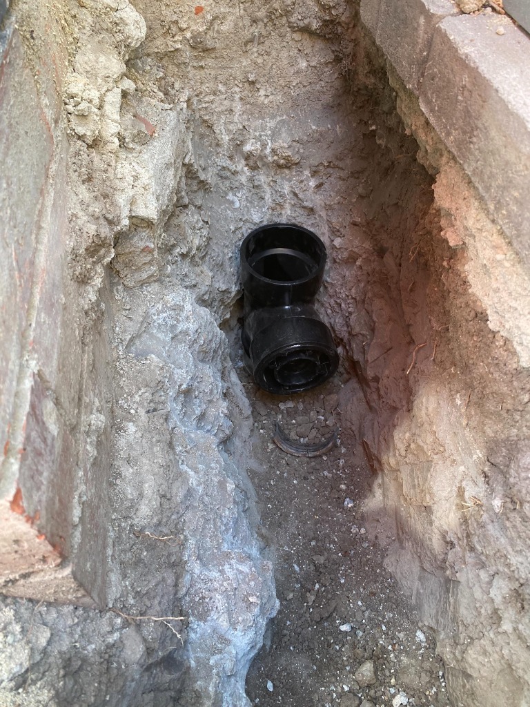 Installing a new exterior sewer cleanout access